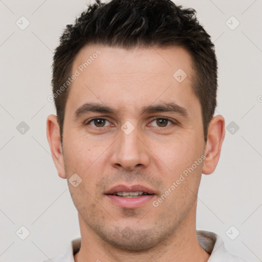 Joyful white young-adult male with short  brown hair and brown eyes