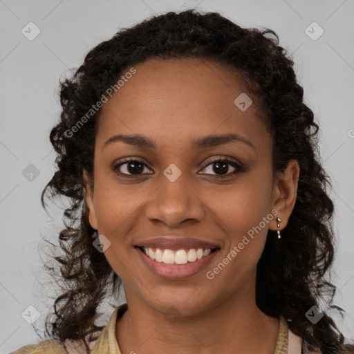 Joyful black young-adult female with medium  brown hair and brown eyes