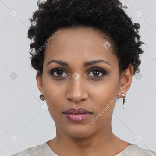 Joyful black young-adult female with short  black hair and brown eyes