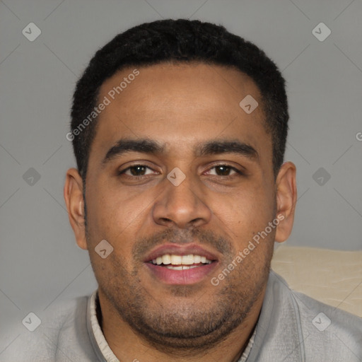Joyful black young-adult male with short  black hair and brown eyes
