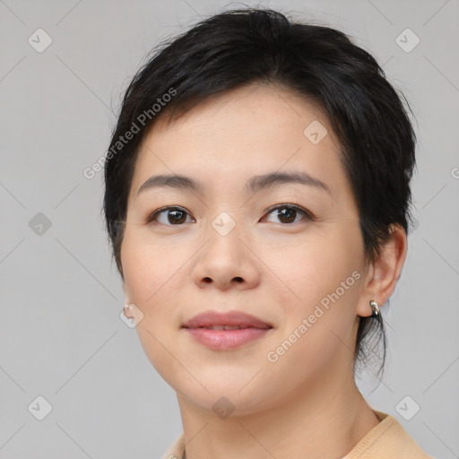 Neutral asian young-adult female with medium  brown hair and brown eyes
