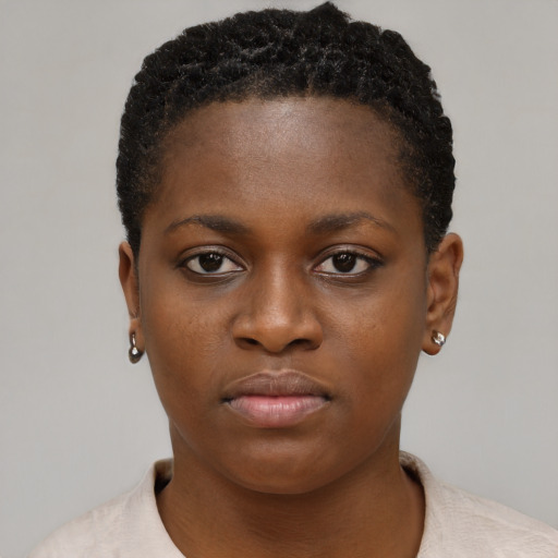Neutral black young-adult female with short  brown hair and brown eyes