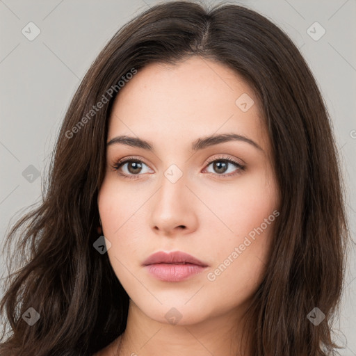 Neutral white young-adult female with long  brown hair and brown eyes