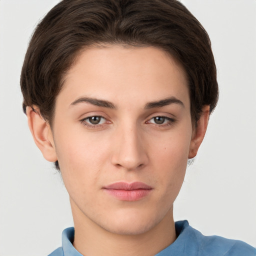 Neutral white young-adult female with short  brown hair and brown eyes