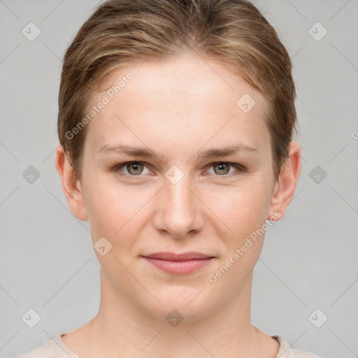 Joyful white young-adult female with short  brown hair and grey eyes