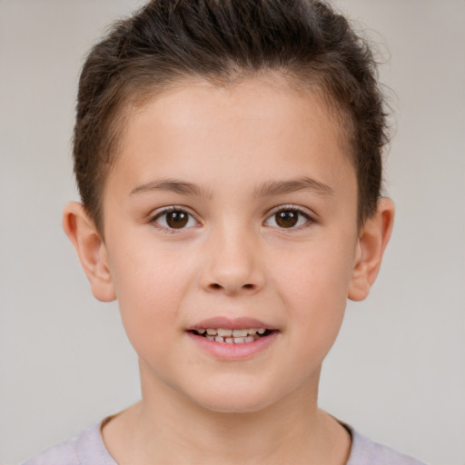 Joyful white child female with short  brown hair and brown eyes