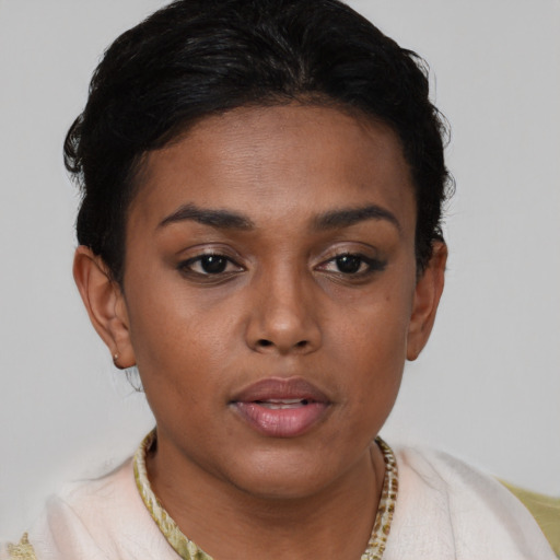 Neutral black young-adult female with short  brown hair and brown eyes