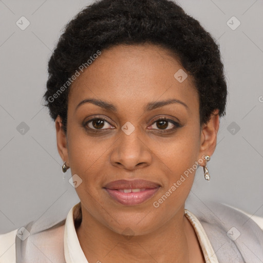 Joyful black young-adult female with short  brown hair and brown eyes