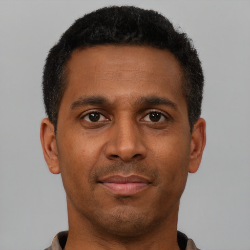 Neutral latino young-adult male with short  brown hair and brown eyes