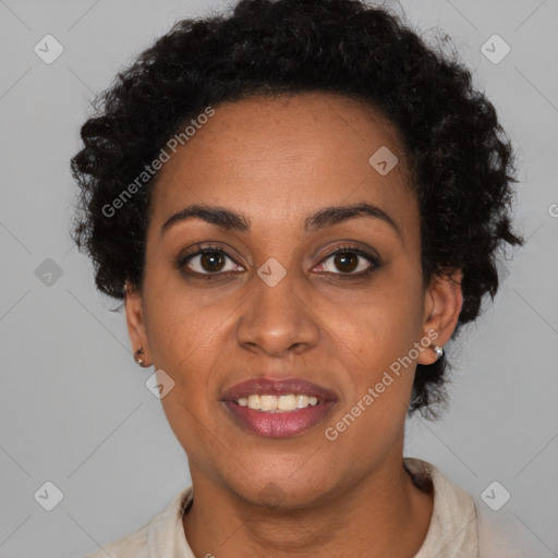 Joyful black young-adult female with short  black hair and brown eyes