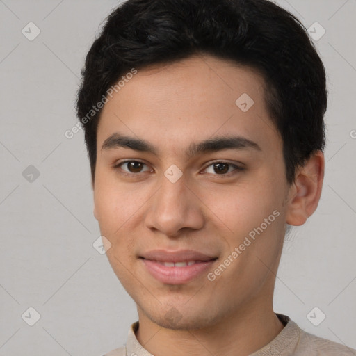 Joyful latino young-adult male with short  brown hair and brown eyes