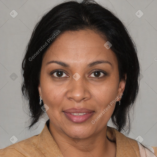 Joyful black adult female with medium  brown hair and brown eyes