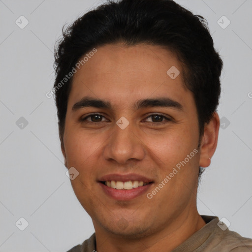 Joyful white young-adult male with short  black hair and brown eyes