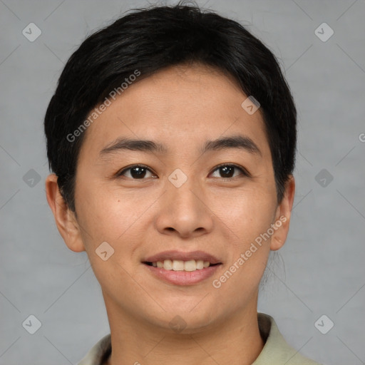 Joyful asian young-adult female with short  brown hair and brown eyes