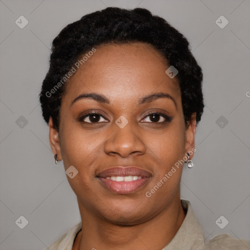 Joyful black young-adult female with short  black hair and brown eyes