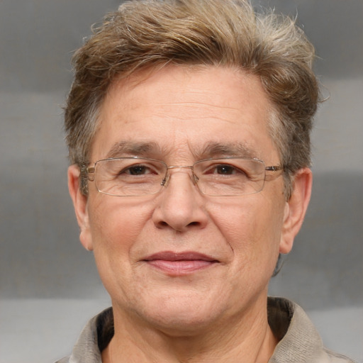 Joyful white middle-aged male with short  brown hair and grey eyes