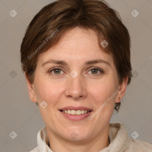 Joyful white adult female with medium  brown hair and brown eyes