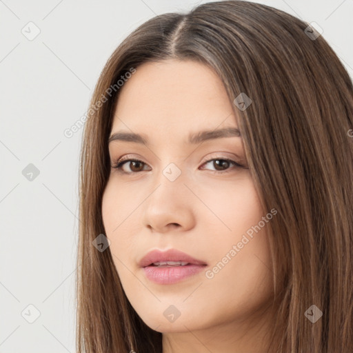 Neutral white young-adult female with long  brown hair and brown eyes