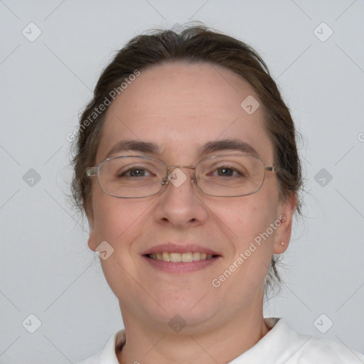 Joyful white adult female with short  brown hair and brown eyes