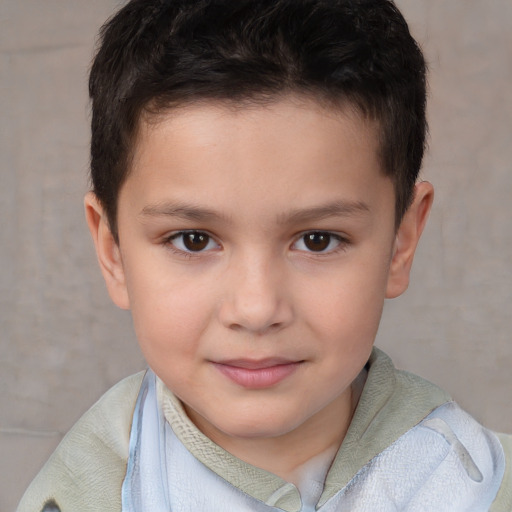 Joyful white child male with short  brown hair and brown eyes