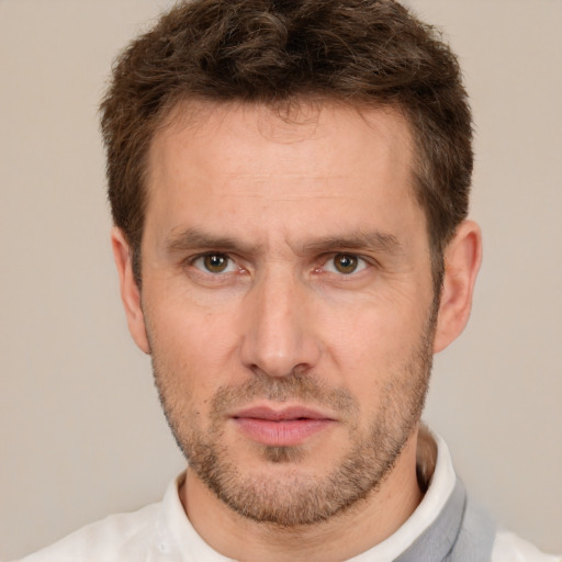 Neutral white adult male with short  brown hair and brown eyes