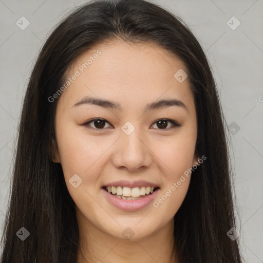 Joyful latino young-adult female with long  brown hair and brown eyes