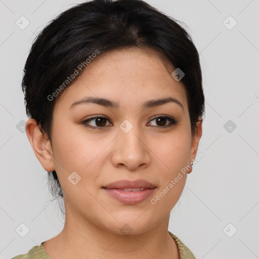 Joyful latino young-adult female with medium  brown hair and brown eyes