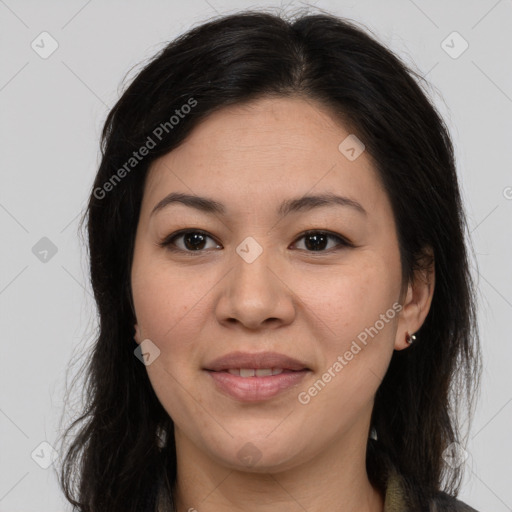 Joyful white adult female with long  brown hair and brown eyes