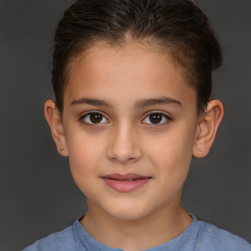 Joyful white child female with short  brown hair and brown eyes