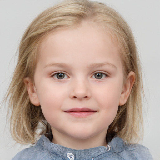 Joyful white child female with medium  brown hair and blue eyes