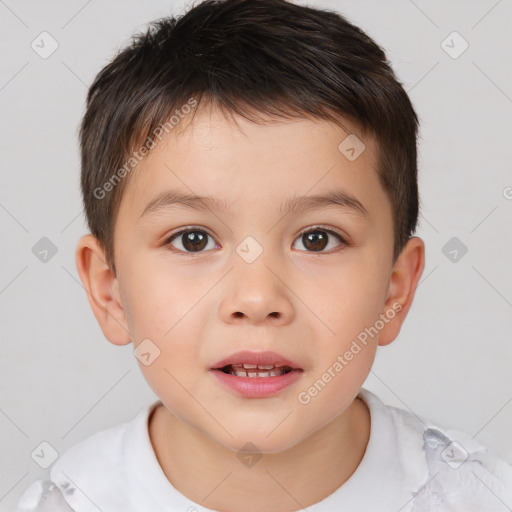 Joyful white child male with short  brown hair and brown eyes