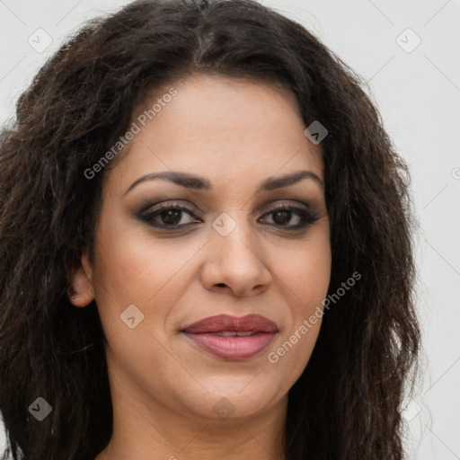 Joyful latino young-adult female with long  brown hair and brown eyes