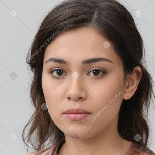 Neutral white young-adult female with medium  brown hair and brown eyes