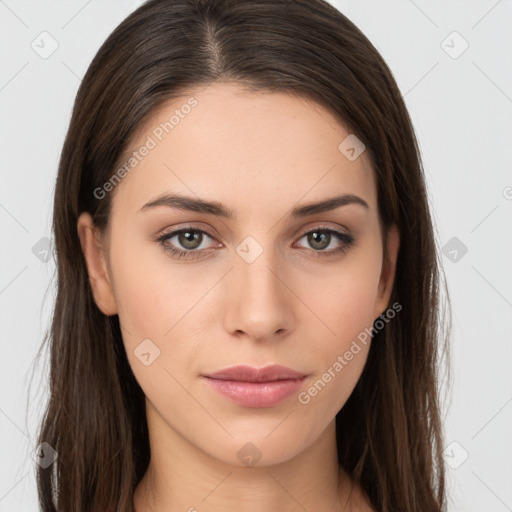 Neutral white young-adult female with long  brown hair and brown eyes