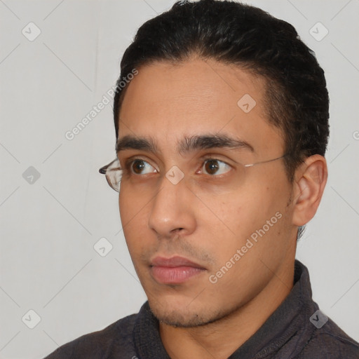 Neutral latino young-adult male with short  black hair and brown eyes