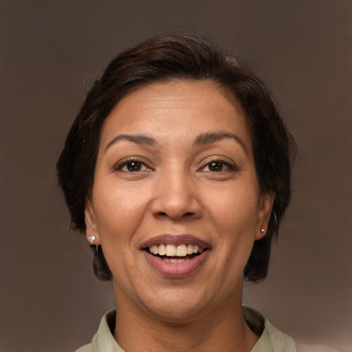 Joyful white adult female with short  brown hair and brown eyes