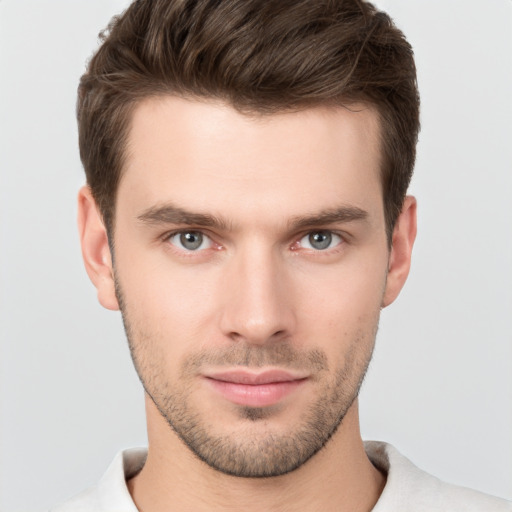 Neutral white young-adult male with short  brown hair and brown eyes