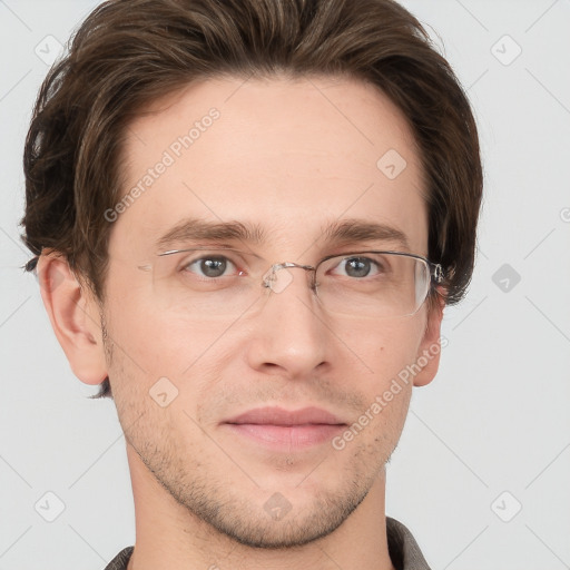 Joyful white adult male with short  brown hair and grey eyes