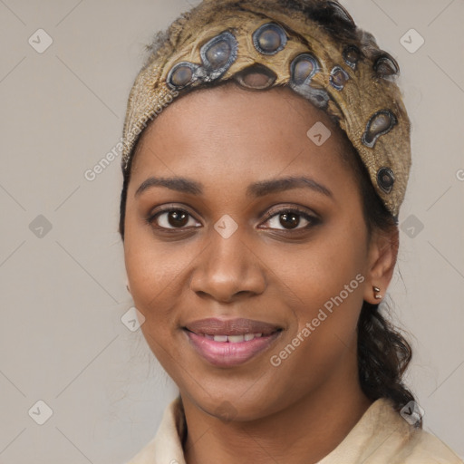 Joyful black young-adult female with medium  brown hair and brown eyes