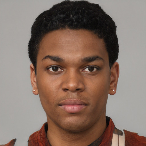 Neutral black young-adult male with short  black hair and brown eyes