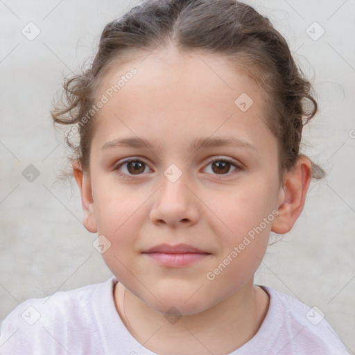 Joyful white child female with short  brown hair and brown eyes