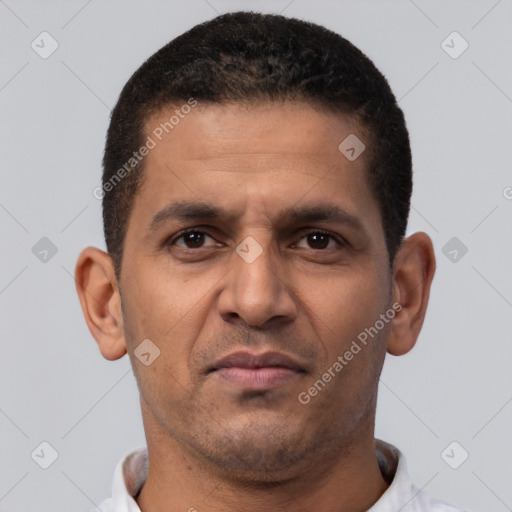 Neutral latino young-adult male with short  brown hair and brown eyes