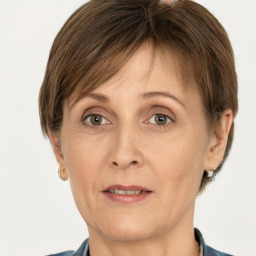 Joyful white adult female with short  brown hair and grey eyes