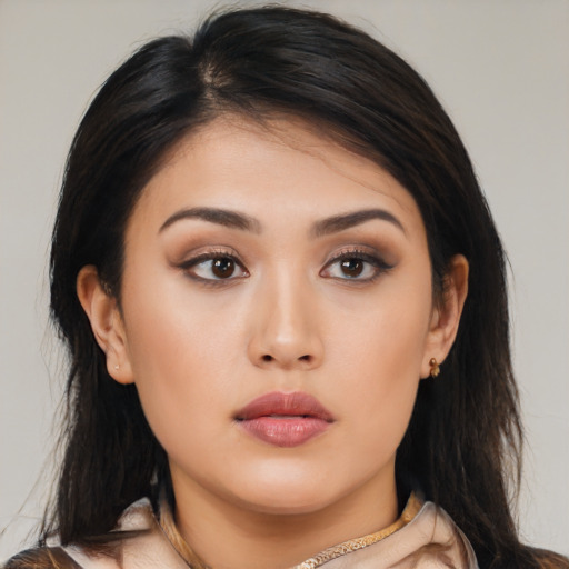 Neutral asian young-adult female with medium  brown hair and brown eyes