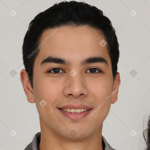 Joyful latino young-adult male with short  black hair and brown eyes