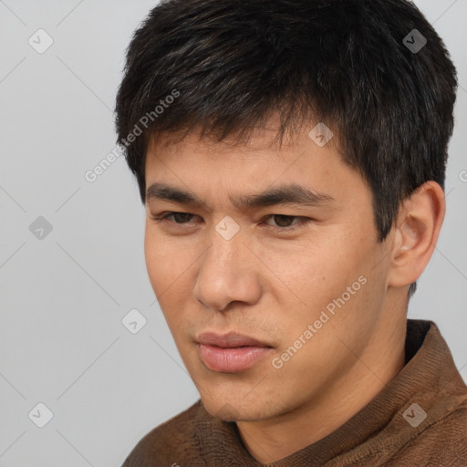 Neutral asian young-adult male with short  brown hair and brown eyes