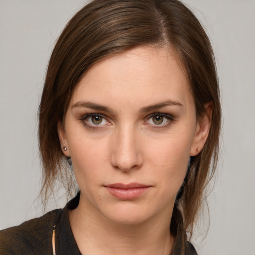 Neutral white young-adult female with medium  brown hair and brown eyes