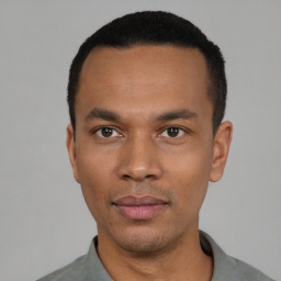 Neutral black young-adult male with short  black hair and brown eyes