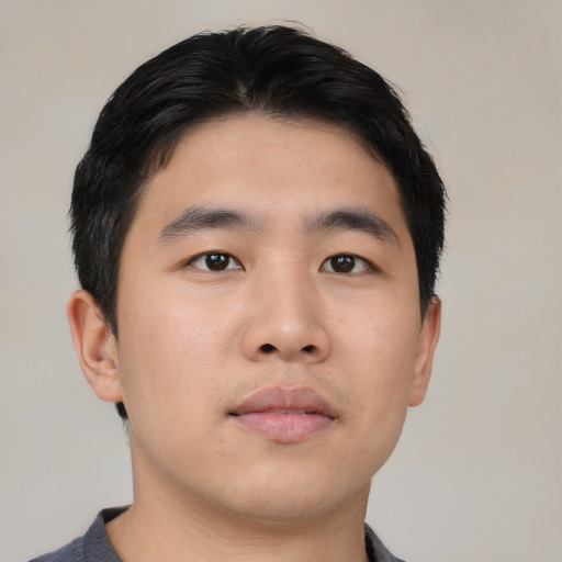 Neutral asian young-adult male with short  black hair and brown eyes