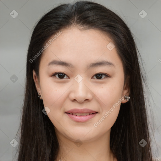 Joyful asian young-adult female with long  brown hair and brown eyes